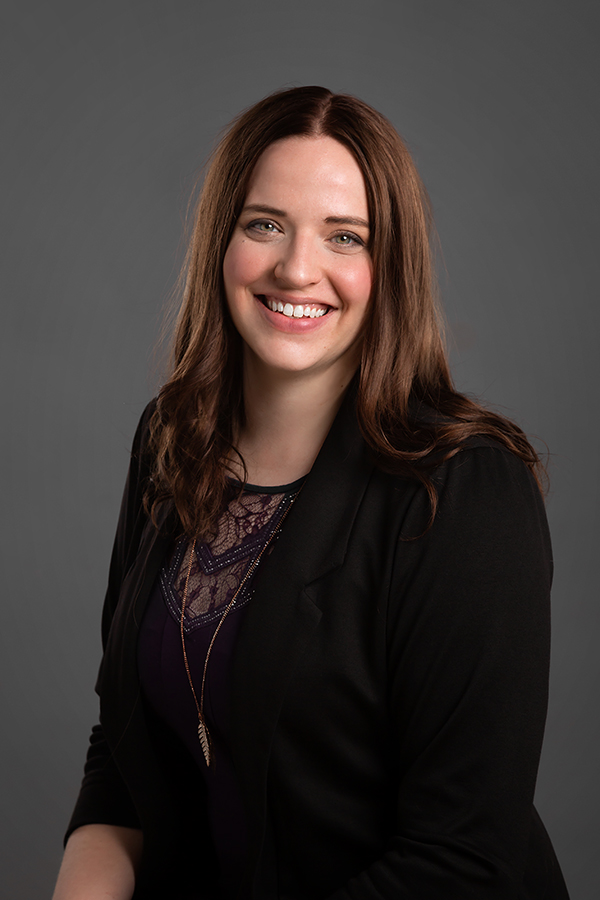 Alia Paetkau-Wiebe working at Oliver's Funeral Home, Grande Prairie, Alberta