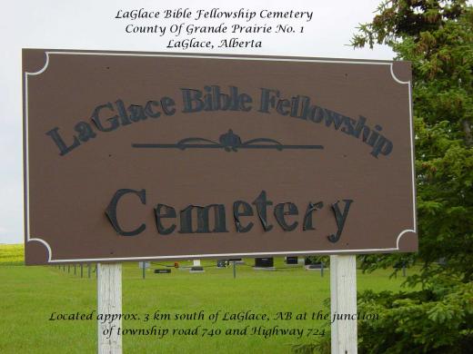 La Glace Bible Fellowship Cemetery sign with the cemetery in the background