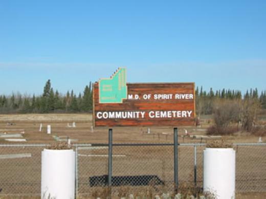 Spirit River Municipal District Cemetery sign with the cemetery in the background
