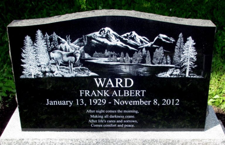 Granite Monument that is black with a scene of an elk by the river with trees an the mountains in the distance. A poem on the bottom reads after night comes morning, making all darkness cease. After life's cares and sorrows, comes comfort and peace.