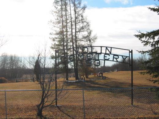 Volin Cemetery sign with the cemetery in the background