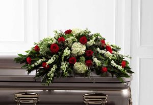 red and white casket spray Grande prairie funeral flowers
