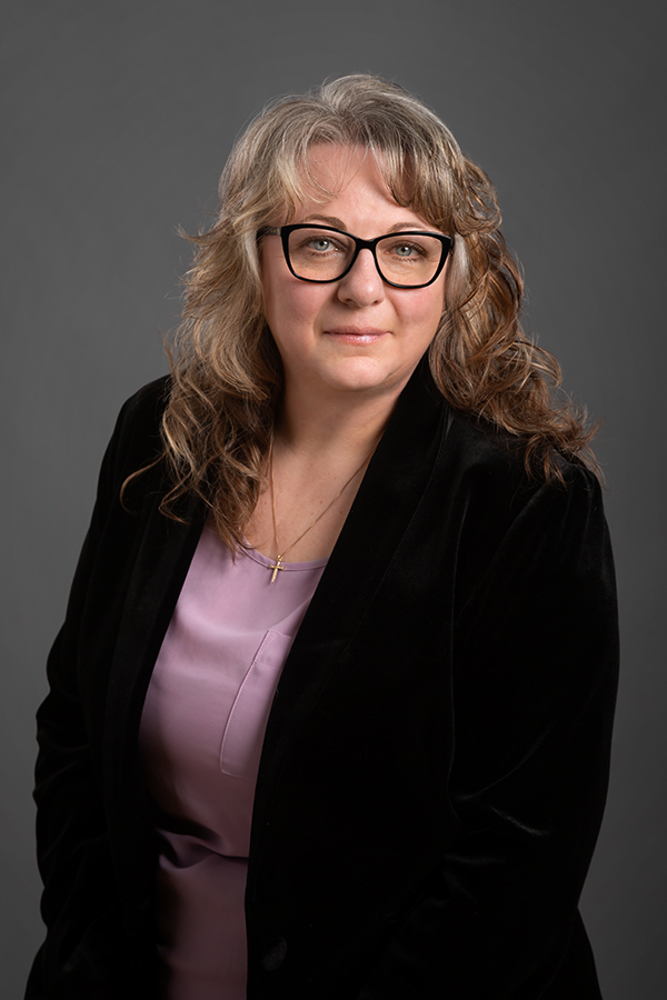 Kimberly Talmey working at Oliver's Funeral Home, Grande Prairie, Alberta