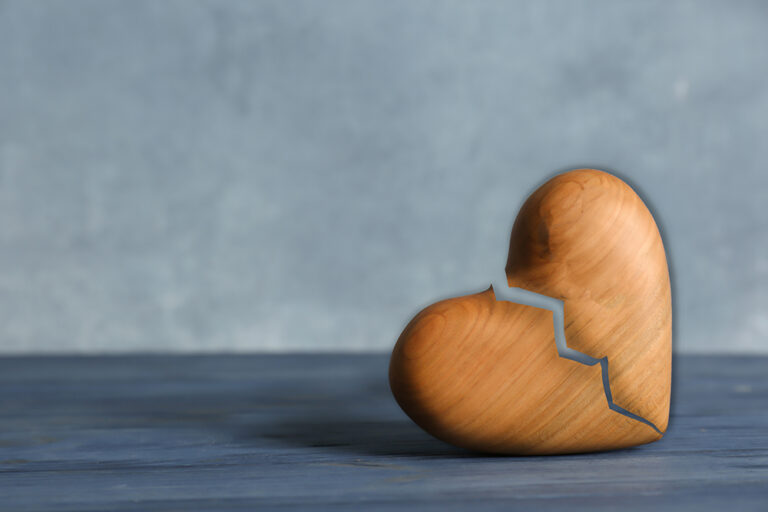 Wooden heart that is broken.