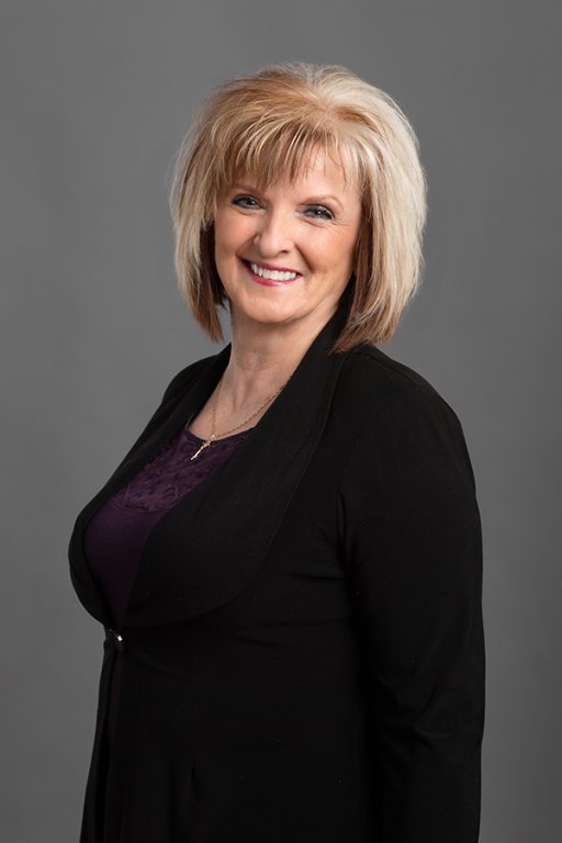 LoAnn Huether working at Oliver's Funeral Home, Grande Prairie, Alberta